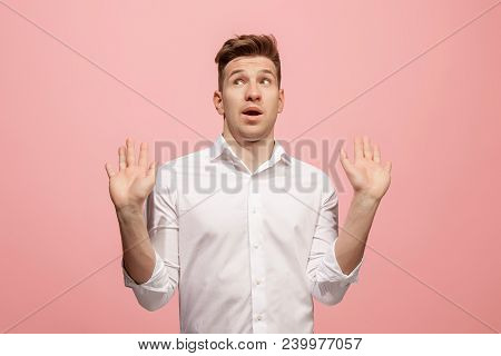 Argue, Arguing Concept. Beautiful Male Half-length Portrait Isolated On Pink Studio Backgroud. Young