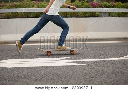 One Young Woman Skateboarder Sakteboarding On Highway