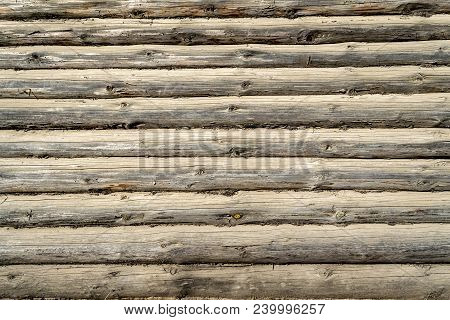 Modern Hand Hewn Natural Log Cabin Wall Facade Fragment Texture. Rustic Log Wall Horizontal Timber B