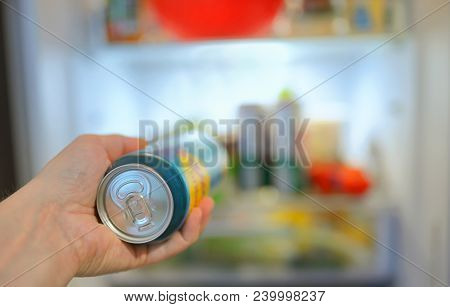 Man Taking Beer Can From Fridge, Close Up
