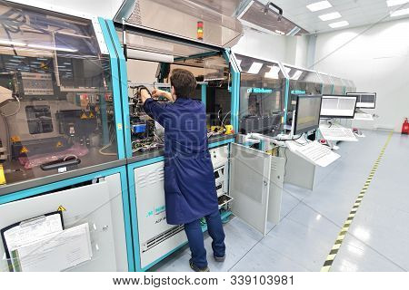 Moscow, Russia - Dec. 5.2019. Worker At The Machine In Mikron - Largest Plant For Production Of Chip