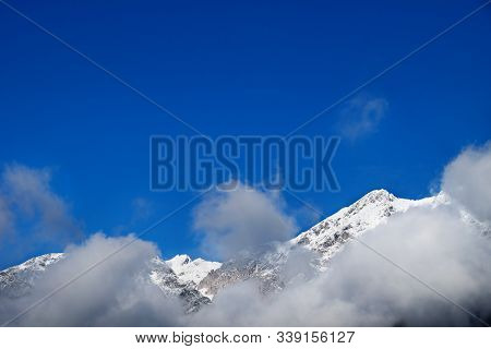 Rocky Mountain Tops With Snow, Clouds And Blue Cloudless Sky, Wildermieming, Tirol, Austria