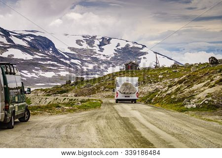 Mountains Landscape And Camper Car On National Tourist Scenic Route Gamle Strynefjellsvegen. Travel 