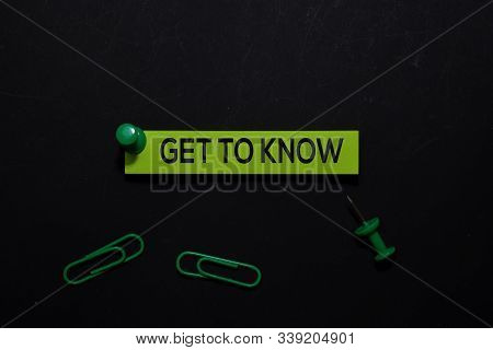 Get To Know Write On Sticky Notes. Top View Isolated On Black Background.