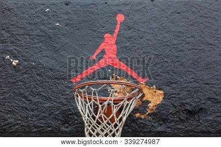Kyiv, Ukraine -  April 21, 2016: Jumpman Logo By Nike Painted On The Black Backboard Of The Old Bask