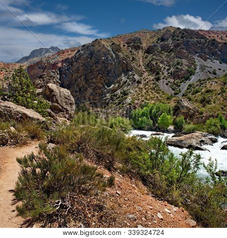Tajikistan. The Pamir Highway. Panorama Of The Mountain River Iskanderdarya Flowing From Lake Iskand