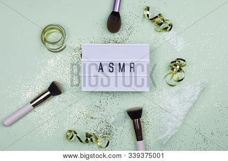 Top View Concept Of Asmr Sound Recordings - Sign On The Table With Some Tools To Make Sounds Around.