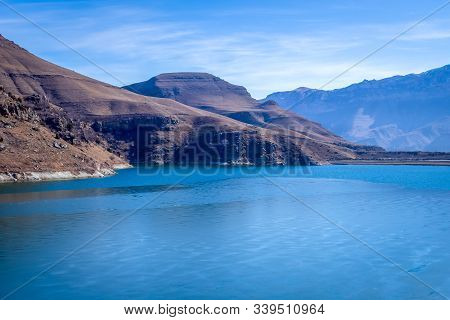 A Frozen Lake Among The Desert Mountains.