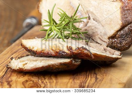 Sliced Bavarian Roasted Pork On Wood With Spice
