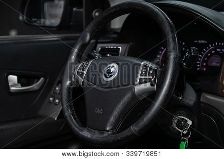 Novosibirsk, Russia - October 26, 2019:  Ssangyong Actyon,  Black Luxury Car Interior - Dashboard, P