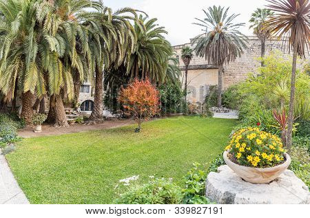 Jerusalem, Israel, December 07, 2019 : Decorative Garden Of The Benedictine Abbey Of Abu Gosh In The