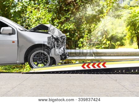 Accident Car Slide On  Truck For Move. Gray Car Have Damage By Accident On Road Take With Slide Truc