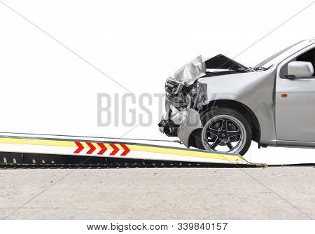Accident Car Slide On  Truck For Move. Gray Car Have Damage By Accident On Road Take With Slide Truc