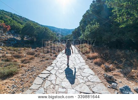 Girl Tourist Go Into The Dikteo Andro Cave Also Known As Birth Place Of Zeus In Crete, Greece