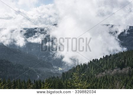 Spring Mountain Landscape With The Black Forest And The Hornisgrinde Mountains Covered By Clouds, In