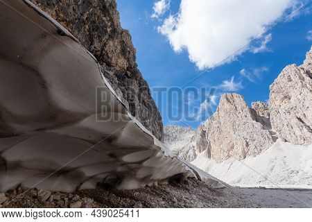 Melting Snow At Antermoia Lake, Dolomites, Catinaccio Group. Italian Dolomites Landscape