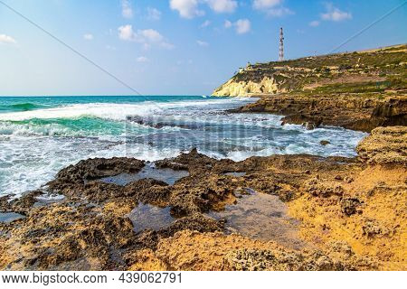 Israel's northern border with Lebanon. Picturesque limestone mountain Rosh - ha - Nikra. Storm on the Mediterranean