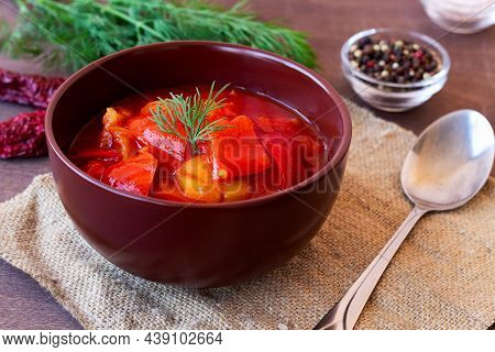 Lecho Of Tomatoes And Red Peppers With Ingredients On The Table. Lecso National Dish Of Hungarian Cu