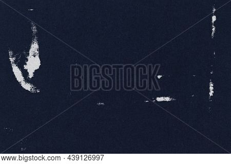 Blue textured background with white fabric stain