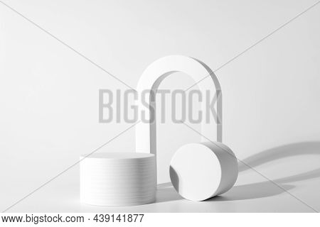 White Podium On The White Background, Simple Geometric Forms. Podium For Product, Cosmetic Presentat