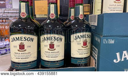 A Display Of Bottles Of Jameson Irish Whiksey  With Background Bokeh At A Binneys Liqour Store In Sp