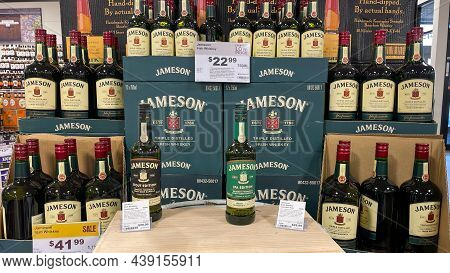 A Display Of Bottles Of Jameson Irish Whiksey  With Background Bokeh At A Binneys Liqour Store In Sp