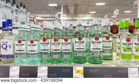 A Display Of Bottles Of Bacardi Rum Superior With Background Bokeh At A Binneys Liqour Store In Spri