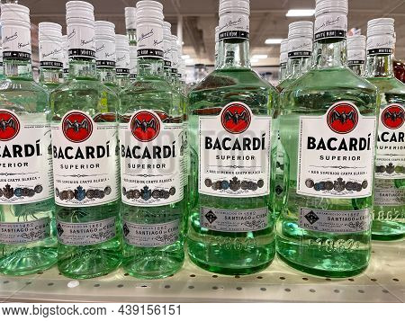 A Display Of Bottles Of Bacardi Rum Superior With Background Bokeh At A Binneys Liqour Store In Spri