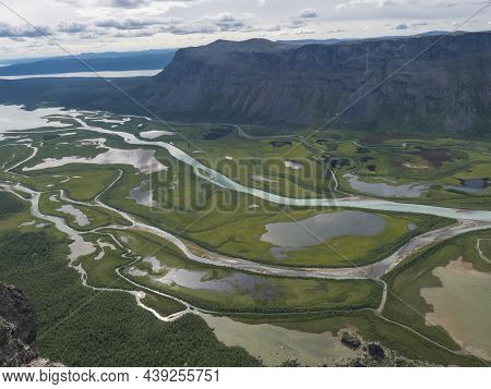 Aerial Scenic View From Skierffe Rock Summit On Glacial Rapadalen River Delta Valley At Sarek Nation