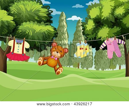 Illustratie van een teddybeer en kleren opknoping