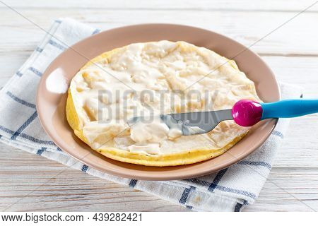 Cooking An Egg Roll. Popular Egg Roll With Cheese And Tomatoes. Selective Focus