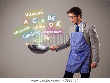 Handsome man cuisson de vitamines et de minéraux