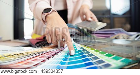 Banner Hand Of Woman Decorator, Interior And Graphic Designer, Architect Is Choosing Catalogue Color