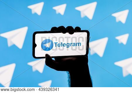 Kazan, Russia - Nov 11, 2021: Smartphone With The Telegram Messenger On The Screen In A Clenched Han