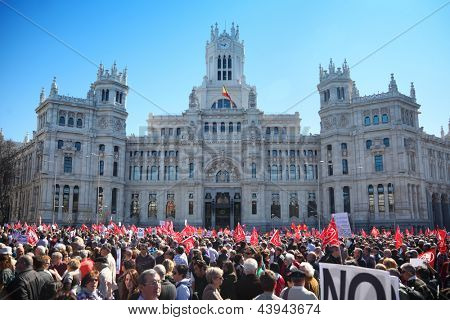 MADRID - MARCH 11: Demonstration of Communist Party near Post Office Building, March 11, 2012 in Madrid, Spain. Spaniards came out on March 11 on streets 60 cities to protest against labor law reform.