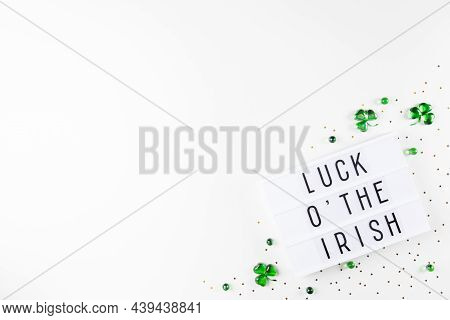 Lightbox With Saint Patricks Day Greeting And Shamrocks Of Green Glass Hearts