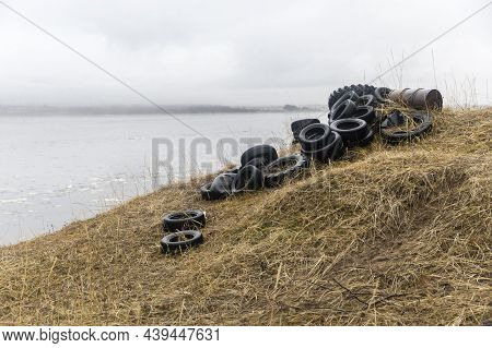 Old Used Tires From A Car On The Banks Of The Varzuga River