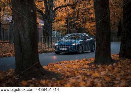 Riga, Latvia-october 6, 2021: Front View Of Blue Ford Mondeo In The City Park During The Beautiful A