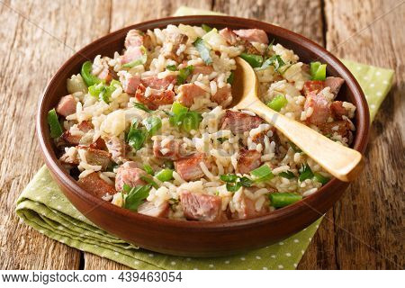 Arroz Carreteiro Is A Hearty Rice And Meat Dish Close Up In The Bowl On The Table. Horizontal