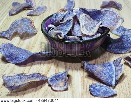 Blue Potato Chips. Potato Crisps On Table. Exotic Blue Chips