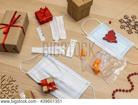Christmas Decoration And Covid Test With Mask On Table