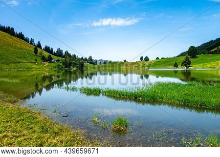 Lake Of The Confins And Mountain Landscape In La Clusaz, Haute-savoie, France