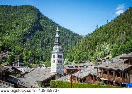 Church And The Village Of La Clusaz In Summer, France