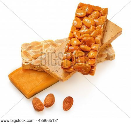 Turron Nougat - Traditional Spanish Almond Dessert Isolated On White Background. Christmas Turron Ca