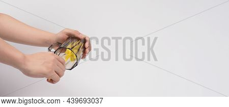 Clean And Wash Dish Concept. Man Hand Washing Drink Glass On White Background.