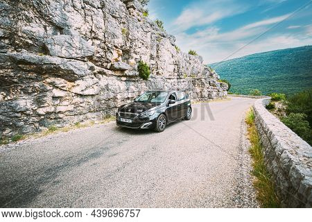 Verdon, France - June 29, 2015: Black Colour Peugeot 308 5-door Car On Background Of French Mountain