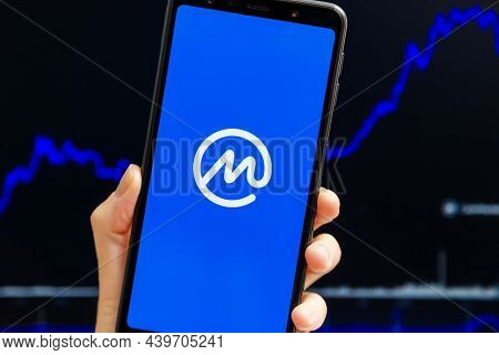 Ukraine, Odessa - October, 9 2021: Hand Holding Mobile With Coinmarketcap App Running At Smartphone 