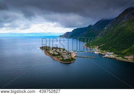 Aerial View Of The Husoy Fishing Village On The Senja Island, Northern Norway. The Village Covers Th