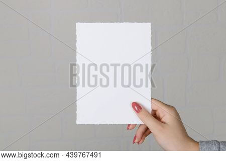 Lose Up Of 5x7 Ratio Card White Empty Card Mockup In Female Hand