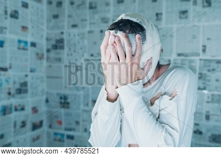 Victim Of Tabloid Journalism And Fake News Infodemic, Conceptual Image Of Man Wrapped In Bandages Su